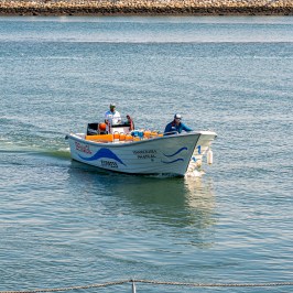 a small boat in a body of water
