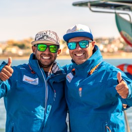 a person in a blue uniform holding a gun