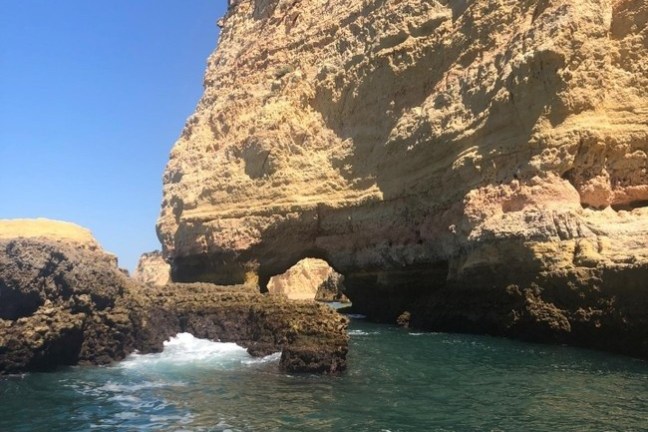 an island in the middle of a rocky mountain